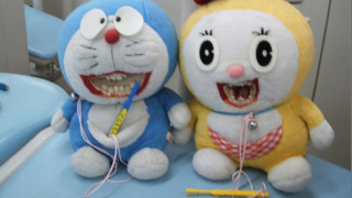 Japan's Favorite Robotic Cat Made Hellish for Good Hygiene